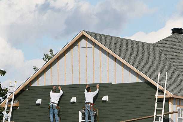 Professional Storm Damage Siding Repair technician working in Sutherland, VA